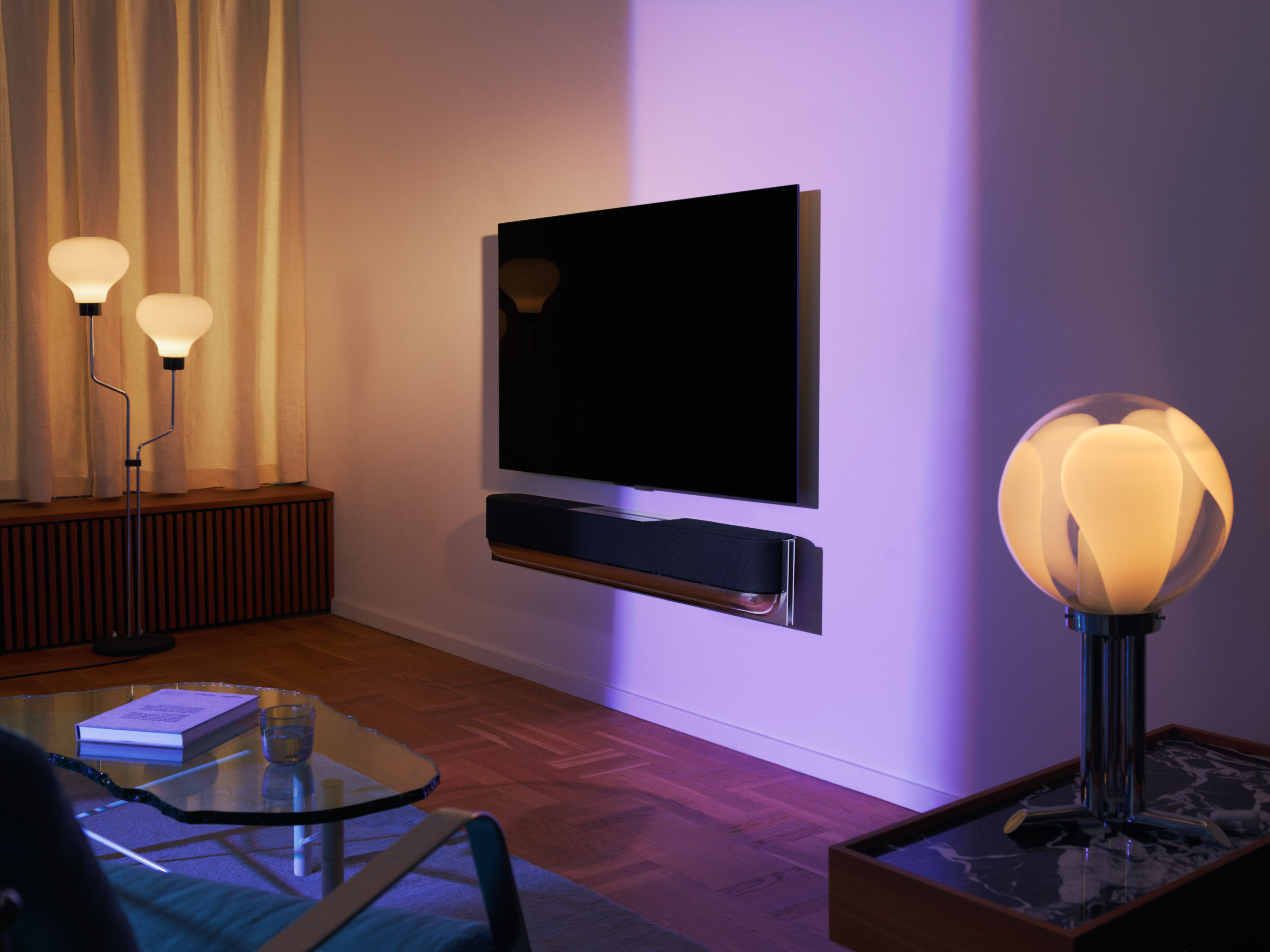 Beosound Theatre soundbar in silver and heather gray fabric finishes in an interior